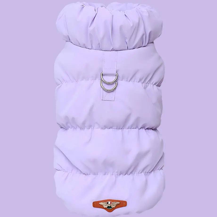 Light purple puffer dog jacket with a metal d ring and a winged badge, displayed on a plain background.