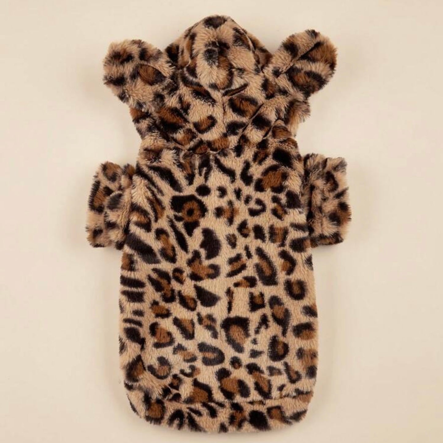 A plush leopard print dog hoodie with bear ears, laid flat to show the full design.