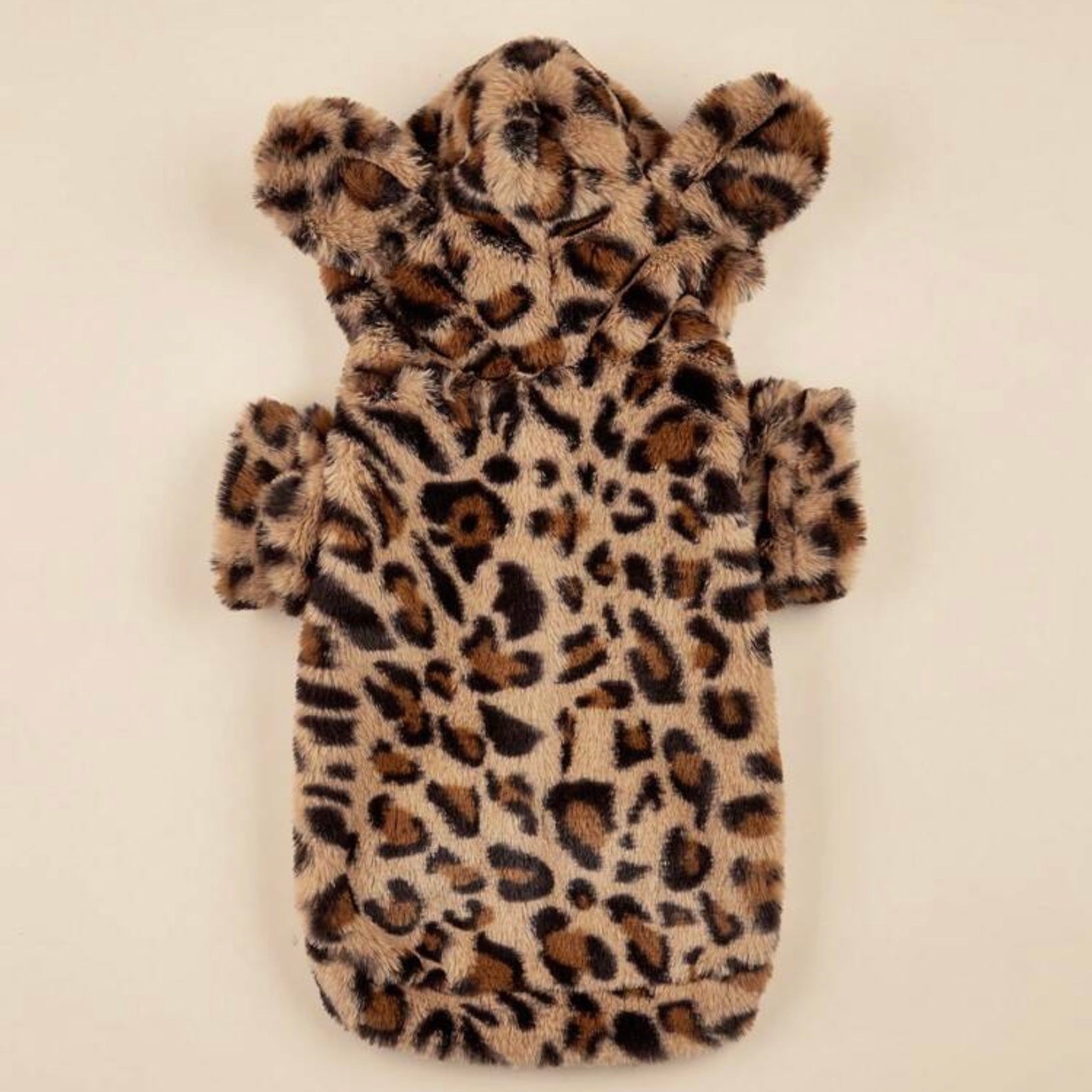 A plush leopard print dog hoodie with bear ears, laid flat to show the full design.
